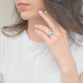 Inel din aur alb cu diamante 0.13 ct și topaz albastru 5.04 ct