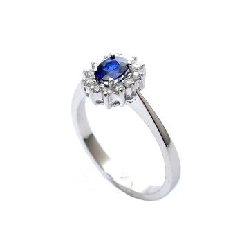 White gold ring with diamonds 0.22 ct and sapphyre 0.37 ct